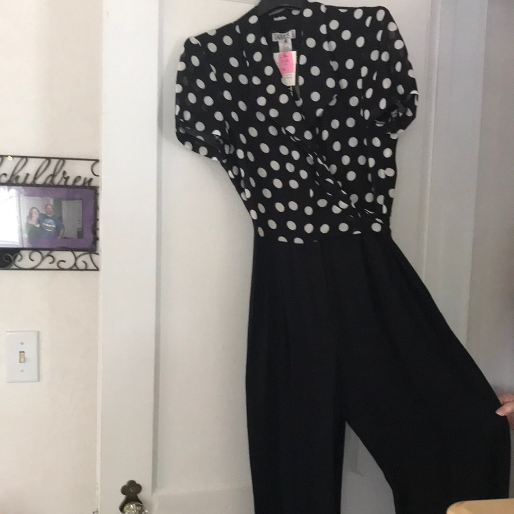 Black & White Polka Dot Jumpsuit
Taurus, new with tags.